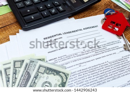 House, home, property, real estate lease rental contract agreement pen money coins keys wooden background, expenses, buying, investment, finance, savings, concept close up