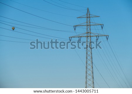Power poles of an overland line in summer