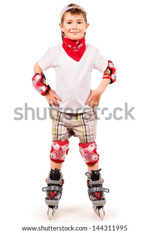Portrait of a cute smiling boy in roller skates. Isolated over white.