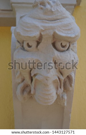 Beautiful Figure Fragment. Traditional Typical Sculpture of 17th century on Old Building in Historical Oldenburg Town, Germany.