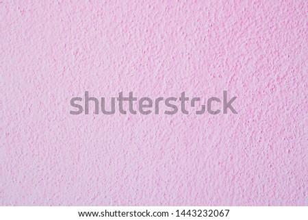 Pink cement or concrete wall texture for background. High resolution through process retouch.