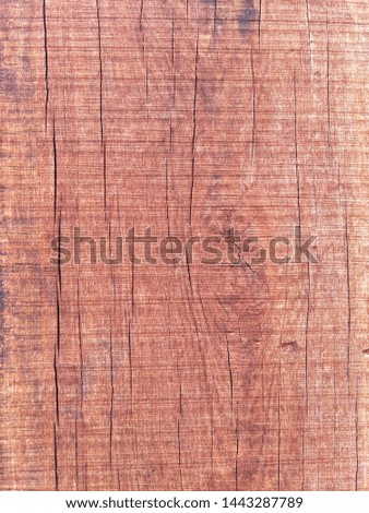 Cracked​ pattern of hard wood surface texture with traces of saw blade for add text or work design for backdrop product.