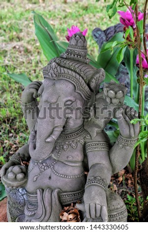 Ganesh,elephant-headed god or son of shiva statue in garden.