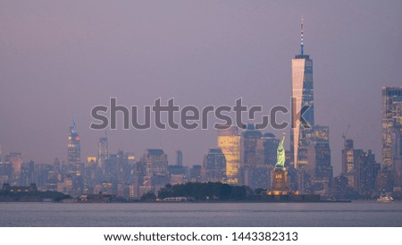 After dusk glow as lights come up in the city across the Hudson Bay in New York