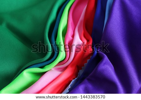Polyester Fabric colorful on background. Royalty-Free Stock Photo #1443383570