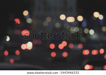 Defocused blur of city street lights at night abstract
