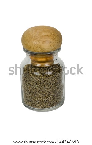 Close-up of a container with cumin seeds