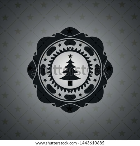 christmas tree icon inside black emblem