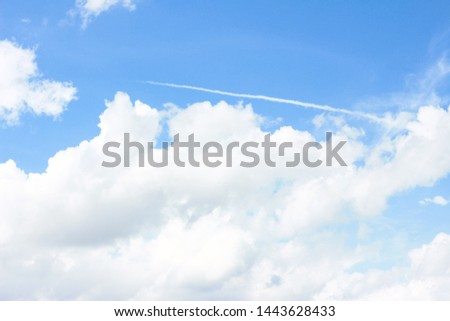blue sky and rocket smoke background. flight texture.