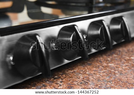 Gas stove on a kitchen counter