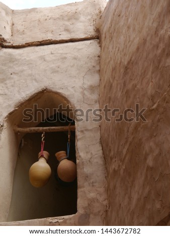 two clay pots hung up for cooling water, Misfah village, Oman, Middle East