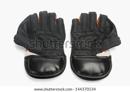Close-up of a pair of wicket keeping gloves