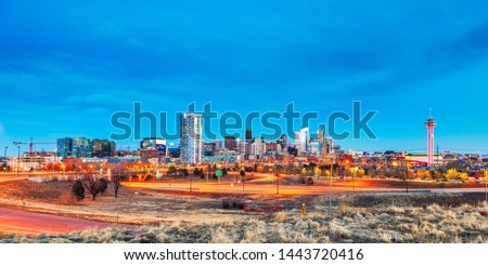  Denver, Colorado, USA downtown city skyline and highways at dawn.