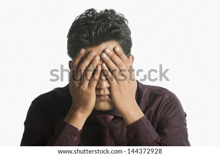 Close-up of a businessman looking upset