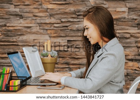 Beautiful business woman working on office
