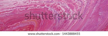 photography of abstract marbleized effect background. red, pink and white creative colors. Beautiful paint. banner