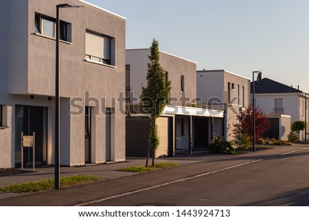 carport garage of entrace area modern houses at south germany summer evening Royalty-Free Stock Photo #1443924713