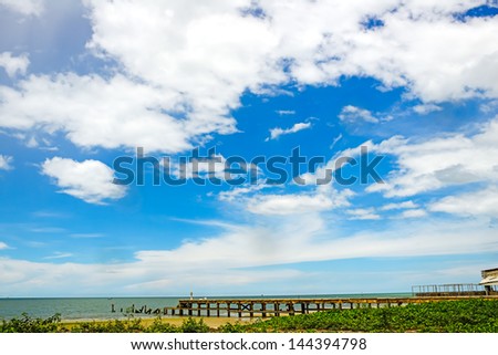 Blue sky and old pier