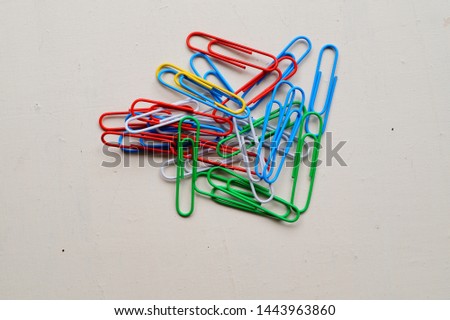 Colored paper clips,
paper clips. School and office accessories