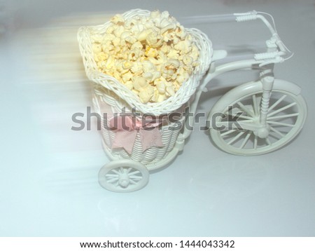 decorative bike carries popcorn in a cart
