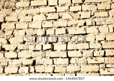 a a white brick wall.