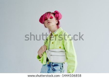 woman with pink hair with bag fashion style