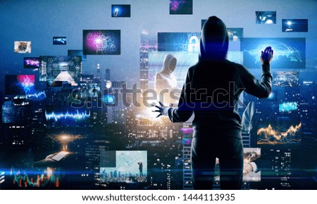 Hacker using abstract digital picture gallery on blurry night city background. Social media and malware concept. Multiexposure 