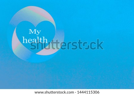 Logo of a heart with an inscription on a blue background