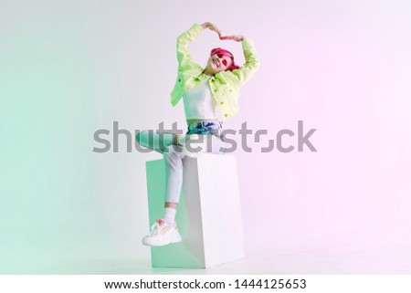 woman with pink hair neon cube