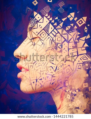 Double exposure profile portrait of beautiful peaceful woman combined with handmade painting of shapes dissolving into her hair