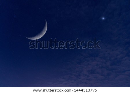 Double Exposure, C-shaped section or Crescent of the moon surface with Blue Sky, Star, Cloud. (Astronomy, Atmosphere, Science) Royalty-Free Stock Photo #1444313795