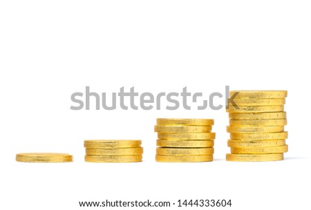 Artificial gold coin stack on white background.