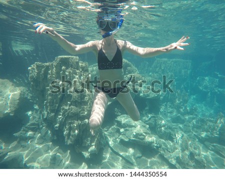 girl under water in tropical Islands