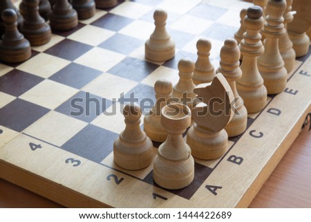 Chess and chessboard. A game of chess, a difficult position.