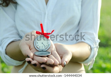 Girl Holding Old Fashioned Pocket Watch