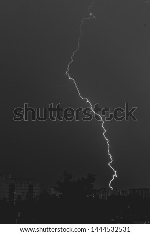 Lightning strike on the cloudy dark sky in Warsaw