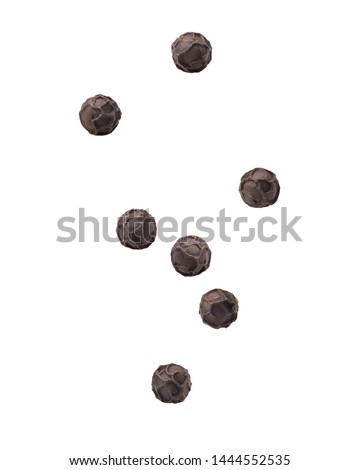 Falling black pepper, peppercorn, isolated on white background, clipping path, full depth of field Royalty-Free Stock Photo #1444552535