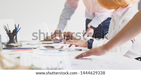 UI UX website development team sketching wireframe layout for responsive web content in studio Royalty-Free Stock Photo #1444629338