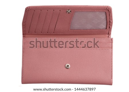 Pink leather opened female wallet isolated on white background. Front view.