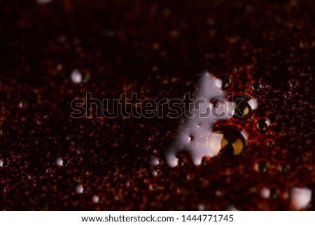 cola background image. brown liquid with bubbles