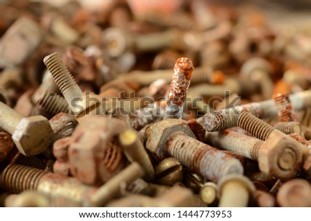 many old rusty nuts and bolts