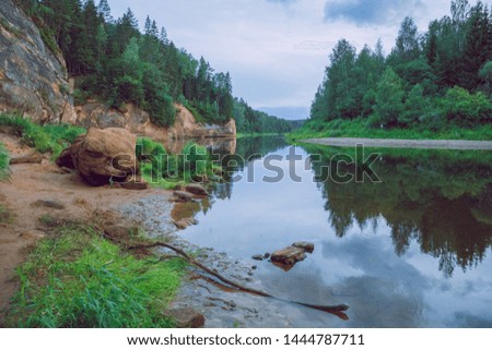 City Cesis, Latvia Republic. Red rocks and river Gauja. Nature  and green trees in summer. July 4. 2019 Travel photo.