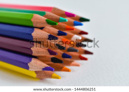 Colored pencils closeup. Sharp sharpened colored pencils closeup
