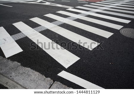 A clear zebra crossing on the beautiful street at an intersection in Naha City, Okinawa, Japan.