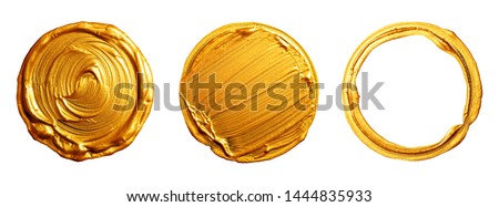 Golden brush strokes on a white background. Round circles in gold.