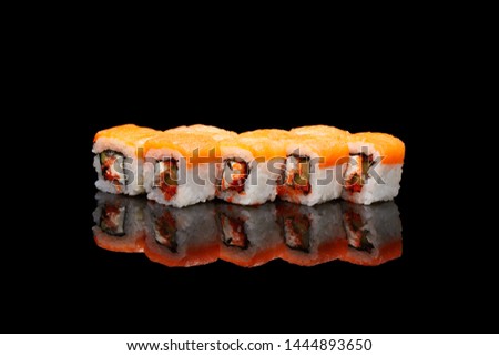 Sushi rolls fish seafood black background