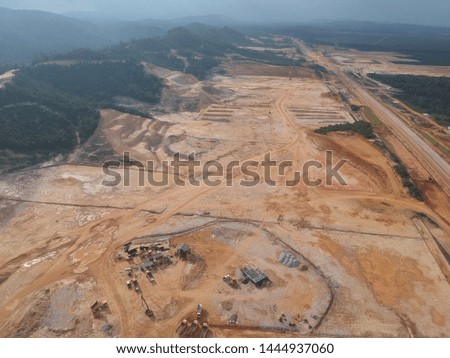 Aerial view at the construction site during earthworks progress.