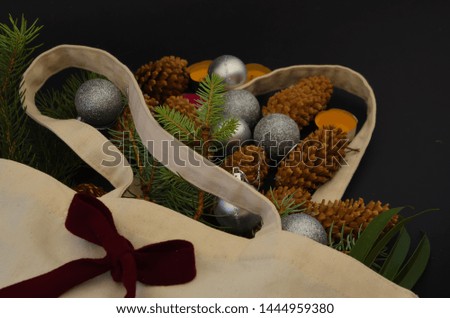 2020  New year Christmas frame with Christmas tree bag on a black background burgundy bow
