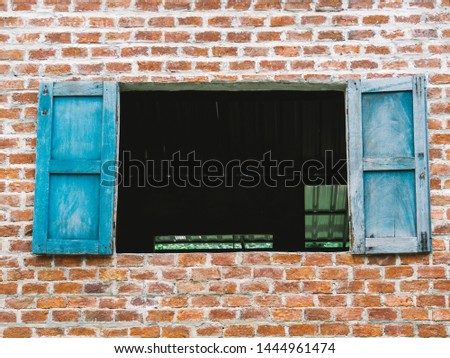 Blue window on brick wall, Vintage wooden windows