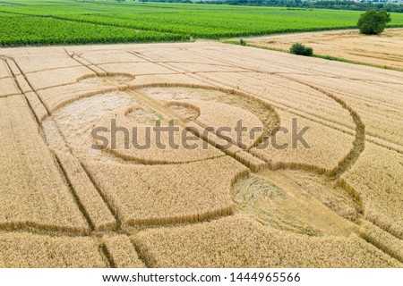 An image of crop circles field Alsace France Royalty-Free Stock Photo #1444965566